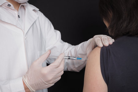 The doctor injection the patient.