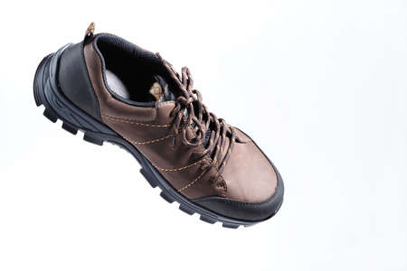 Mens shoes. Fashionable mens shoes or sneakers in isolation on a white background, levitation. High quality photoの写真素材