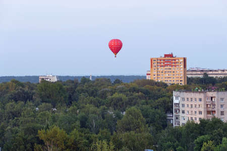 Blue hot air balloon in the sky close-up isolated. High quality photoのeditorial素材