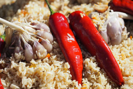 Appetizing Uzbek pilaf with meat and vegetables. High quality photoの写真素材