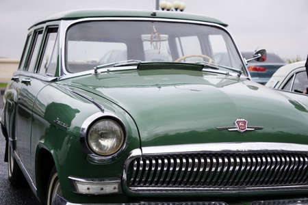 Nizhny Novgorod, Russia, st. Gorkog 23, 10.13.2021. Retro car of the Gorky Automobile Plant. Volga station wagon of green color. Cars out of production. High quality photoのeditorial素材