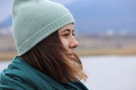 Portrait of a girl of European appearance with long hair on the street. high quality photoの写真素材