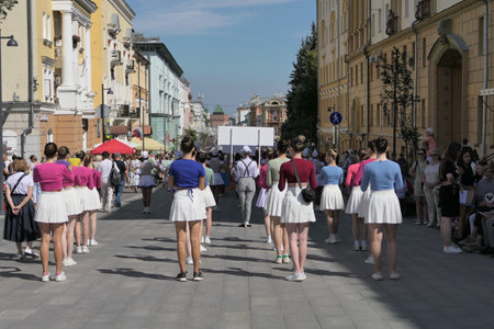 Nizhny Novgorod, Russia, Bolshaya Pokrovskaya street 08.20.2022. Girls in beautiful costumes, artists and participants of the event dedicated to the celebration of the citys day. . High quality photoのeditorial素材