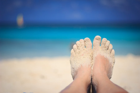 A pair of legs on the beach