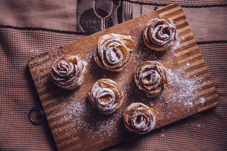 cinnamon rolls in the form of roses. homemade bakingの写真素材