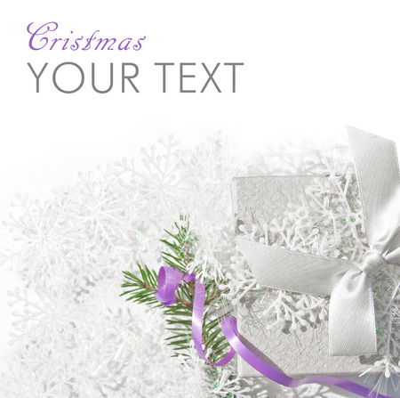 Christmas background with decorative snowflakes and white gift boxes. Top view. Flat layの写真素材