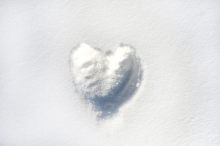 Heart Shape Drawn in Snow