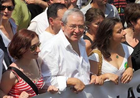 PARIS - JUNE 26: President of the regional council for Île-de-France - Jean-Paul Huchon (C)  in the front row of Paris Gay Pride parade to support gay rights, on June 26, 2010 in Paris, France.のeditorial素材