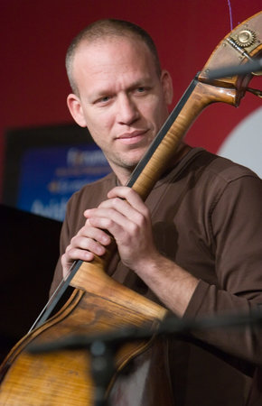 PARIS - MARCH 24: Avishai Cohen, Israeli bassist, composer, bandleader and musician performs live during the Fnac showcase promoting his newest album Aurora on March 24, 2009 in Paris, Franceのeditorial素材