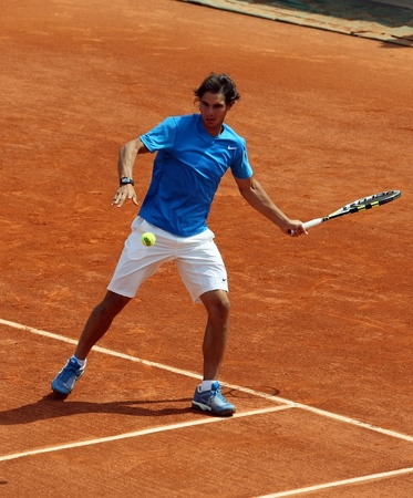 PARIS - MAY 21: Rafael Nadal of Spain plays the exhibition match  at French Open, Roland Garros on May 21, 2011 in Paris, France.のeditorial素材