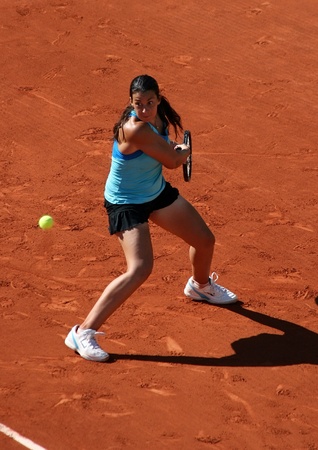 PARIS - MAY 23: Marion Bartoli of France plays the 1st round match at French Open, Roland Garros on May 23, 2011 in Paris, France.のeditorial素材
