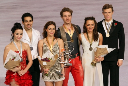 PARIS - NOVEMBER 17: CAPPELLINI/LANOTTE (L); PECHALAT/BOURZAT, RIAZANOVA/TKACHENKO,  during the medal ceremony of the ISU Grand Prix Eric Bompard Trophy on NOVEMBER 17, 2012 at Palais-Omnisports de Bercy, Paris, France.のeditorial素材