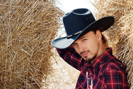 Cowboy in the Hay
