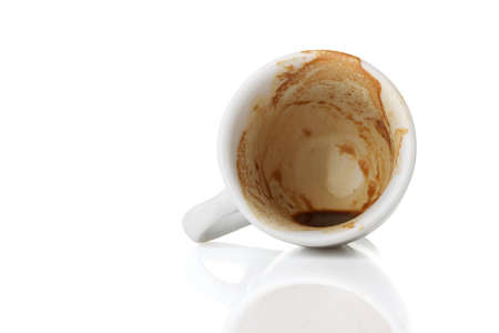 An empty cup of coffee isolated on whiteの写真素材