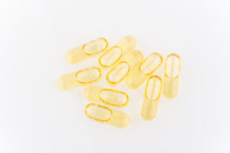 Close up of capsules Omega 3 on light background. Top view. Health care conceptの写真素材