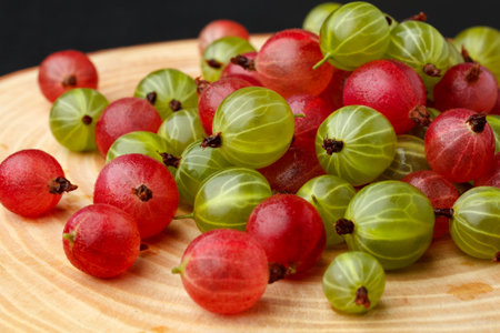 Fresh gooseberry on wooden table. Ripe fruit foodの写真素材
