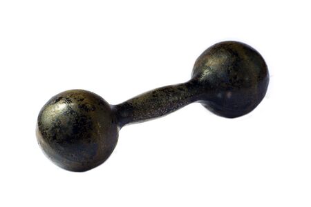 Old-fashioned weights made of pig iron over white backgroundの写真素材