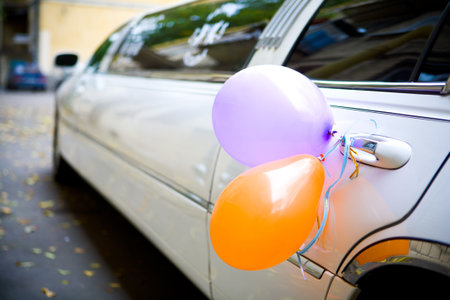 Wedding limousine decorated with baloonsの写真素材