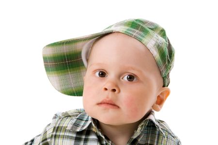 One year boy wearing cap isolated on whiteの写真素材