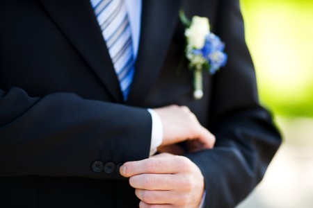 button up detail of groom's wedding dressupの写真素材