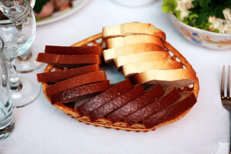 plate with Bread on restaurant table before partyの写真素材