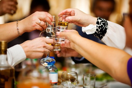 Holiday Event people cheering each other with champagne and wineの写真素材