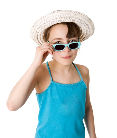 Ten years girl wearing straw hat anf sunglasses isolatedの写真素材