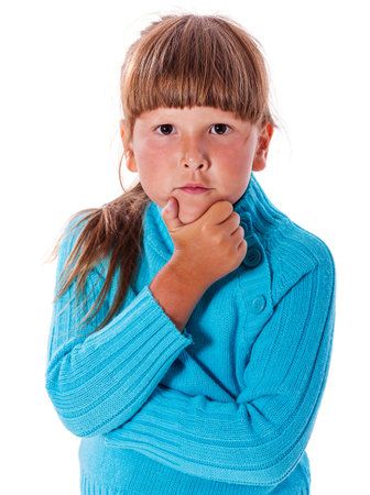 Serious six years girl portrait isolatedの写真素材