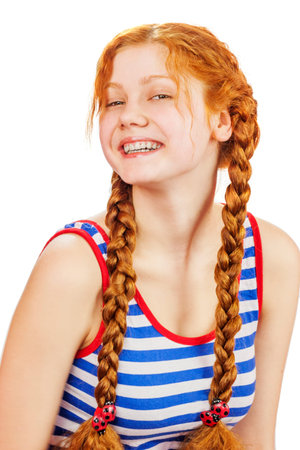 Portrait of happy redhead woman smiling isolated on white