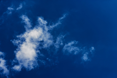 One simple cloud on sky in summer sunny day clean conceptの写真素材