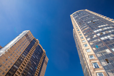Modern building exterior low angle view with blue sky