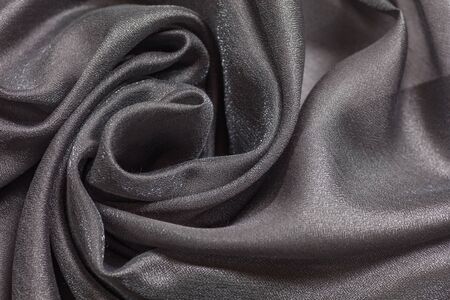 Shiny cloth background with grey vial textile multiple curlsの写真素材