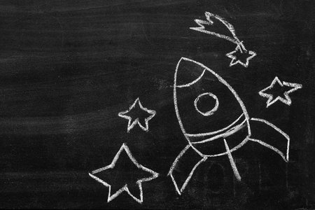 April 12 International Cosmonautics Aviation Day. Hand-drawn rocket, comet, stars, infinite space....