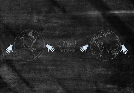 collage on the theme covid-19. Two hemispheres of the earth in medical gloves are at a distanceの写真素材