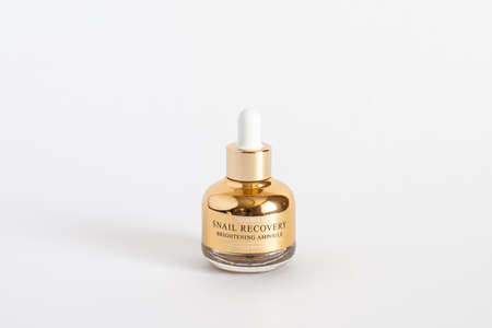 Russia, Rostov-on-Don, 05.07.2018 Korean cosmetics, deoproce snail recovery brightening ampoule, isolated on white background.のeditorial素材