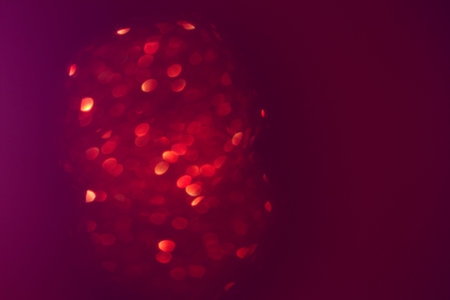 Abstract glitter lights background. red, purple and gold. 