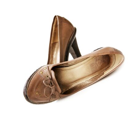 Shabby woman's brown Leather shoes with bowsの写真素材