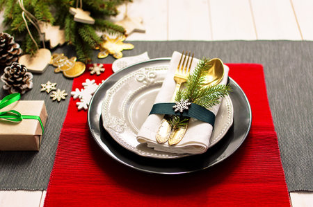 Christmas serving table. Traditional festive decoration background top view. Cutlery utensils...