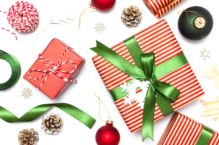 Gift boxes, Christmas balls, toys, fir cones, ribbon on white background. Festive, congratulation, New Year Christmas presents Xmas holiday 2019 greeting card. Flat lay top view copy space.の写真素材