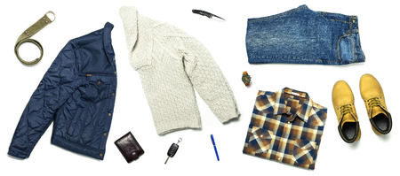 Flat lay set Men's casual clothing, jacket jeans checkered shirt knitted sweater yellow nubuck shoes strap wrist watch wallet car keys isolated items on white background top view. Male fashion.の写真素材
