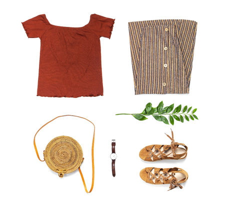 Stylish trendy feminine summer clothing set, skirt, jacket, suede sandals, round rattan bag shawl watch on white background. Female fashion background, beauty or fashion blog concept Flat lay top view.の写真素材