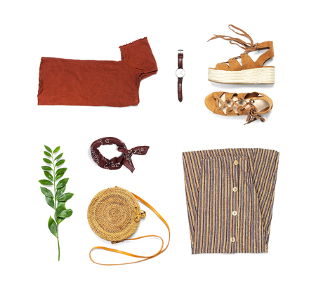 Stylish trendy feminine summer clothing set, skirt, jacket, suede sandals, round rattan bag shawl watch on white background. Female fashion background, beauty or fashion blog concept Flat lay top view.の写真素材