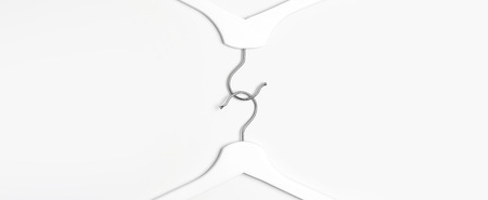 Flat lay top view White wooden hangers on white background copy space minimalism style. Sale discount store shopping concept, design empty hanger. Creative fashion beauty feminine blog.の写真素材