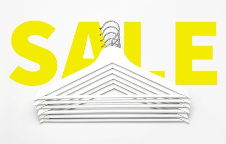 Sale concept. Discount store shopping. Flat lay top view White wooden hangers on white backgroundの写真素材