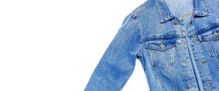 Close-up Blue denim jacket on isolated white background top view flat lay copy space. Denim, fashionable jacket, women's or men's trend clothing, fashion background. Store concept, sale.の写真素材