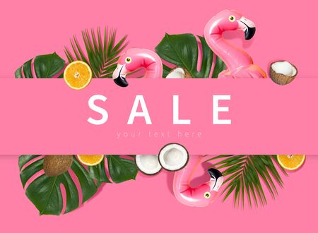 Creative concept of summer sales. Inflatable pink mini flamingo tropical palm leaf monstera coconut orange on pink background pool float party. Flat lay Flamingo Trend Inflatable Toy. Discounts, sale.の写真素材
