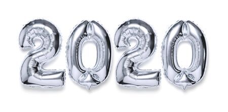 2020 inflatable silvery numbers with shadow on white isolated background. New year winter decoration, holiday symbol, party item, element for design. Merry Christmas greeting card. Happy New Year.の写真素材