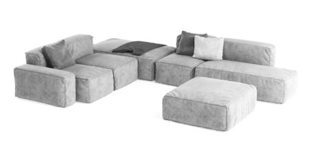 Modern gray modular sofa with pillows and plaid isolated on white background. Furniture, interior object, stylish sofa. High tech style, subject for minimalistic interior design.の写真素材