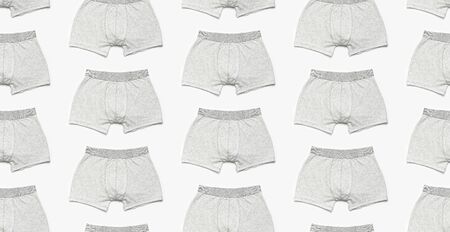 Seamless Pattern Mens underwear, gray underpants on white background flat lay top view copy space. Fashion blog, natural underwear, advertising, shopping concept. Pants boxers.の写真素材