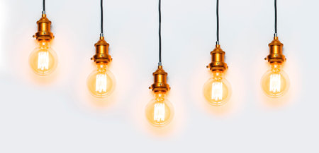 Creative idea concept, designer lamp, modern interior item. Vintage fashionable edison lamp on light...